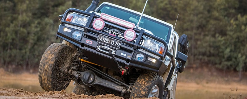 4WD driving through river- 4x4 suspension